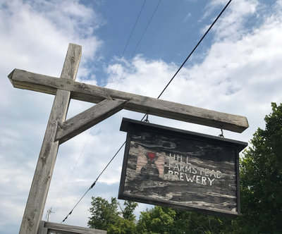 I know I post a picture of this Hill Farmstead sign every year, but I like it, so you get another.